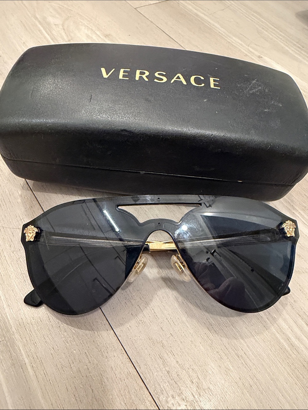 Versace Black Shield Sunglasses with Gold Medusa Details